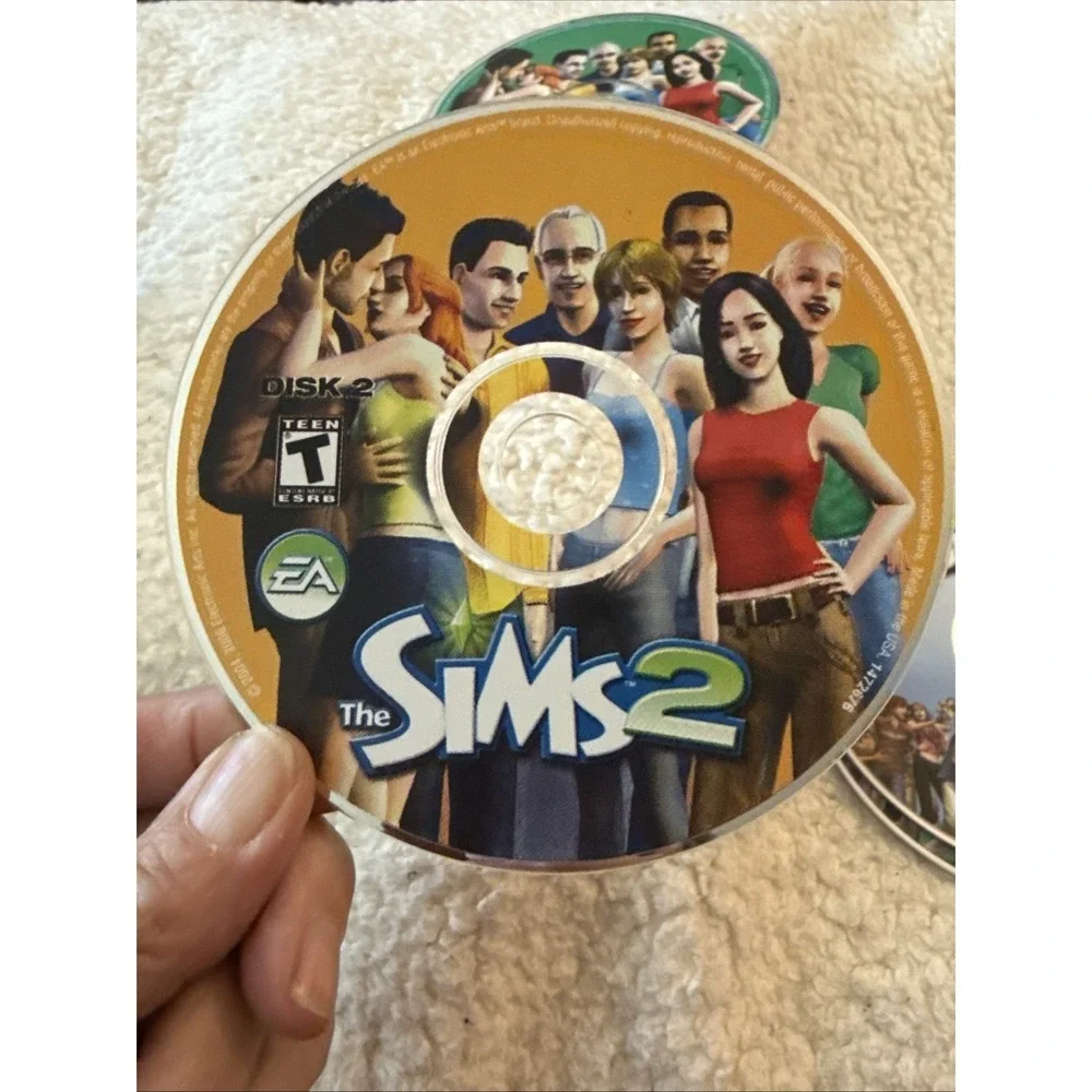 The Sims 2 (PC, 2004 - 5 Discs) Complete No Manual Pre Owned Case Needs Work